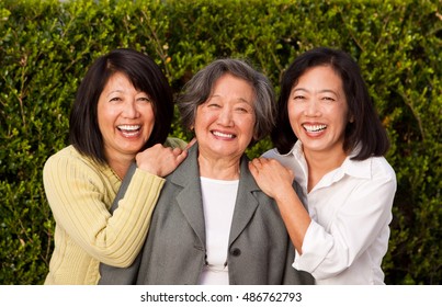 Senior Woman With Her Adult Daughters.