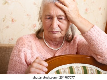 Senior Woman With Her Caregiver At Home