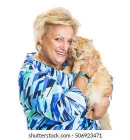 Senior Woman Holding Cat While Looking Into Camera And Smiling. Isolated On White. 