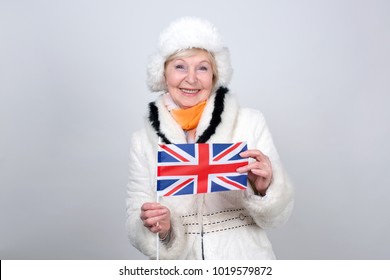 senior-woman-holding-flag-great-260nw-1019579872.jpg