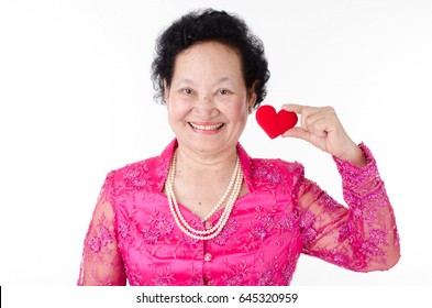 Senior Woman Holding Heart