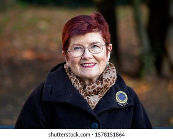 Senior Woman In Hyde Park, London. Autumn