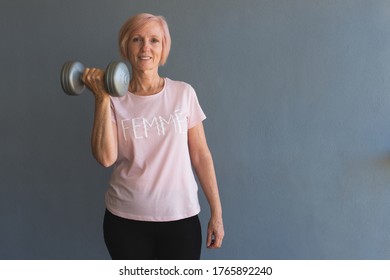 Senior Woman Lifting Weights Staying Fit