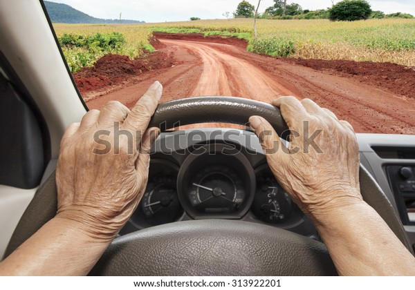 Senior woman lost way on\
rural road