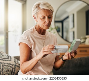 Senior woman, medicine pills and reading instructions on healthcare, medical wellness and pharmacy tablet box in house living room. Thinking retirement elderly with insurance drugs product in Sweden - Powered by Shutterstock