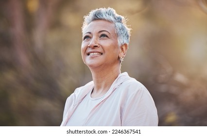 Senior woman, nature and thinking while outdoor for freedom, happiness and a healthy lifestyle with fitness and fresh air. Face of happy black female at park for peace, health and wellness in summer - Powered by Shutterstock