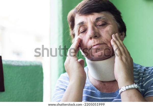 Senior woman with neck\
injury