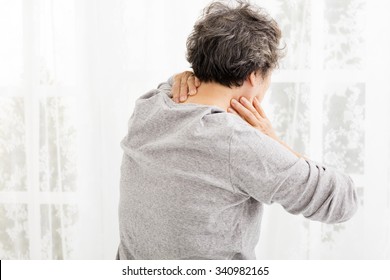  Senior Woman With Neck Pain