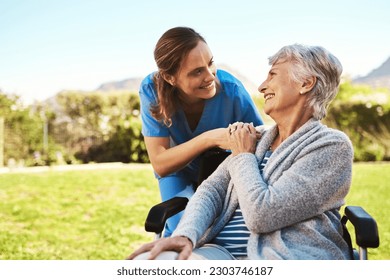 Senior woman, nurse and wheelchair in life insurance, healthcare support or garden at nursing home. Happy elderly female and caregiver for person with a disability, health or retirement in nature - Powered by Shutterstock