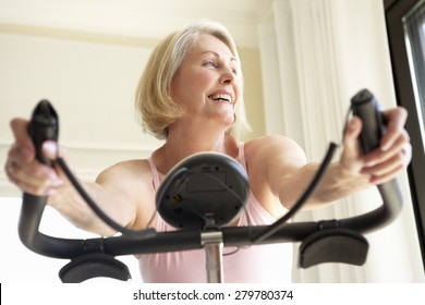 Senior Woman On Exercise Bike