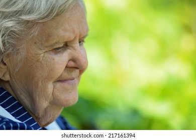 Senior Woman On The Veranda Of His Home. MANY OTHER PHOTOS FROM THIS SERIES IN MY PORTFOLIO. 