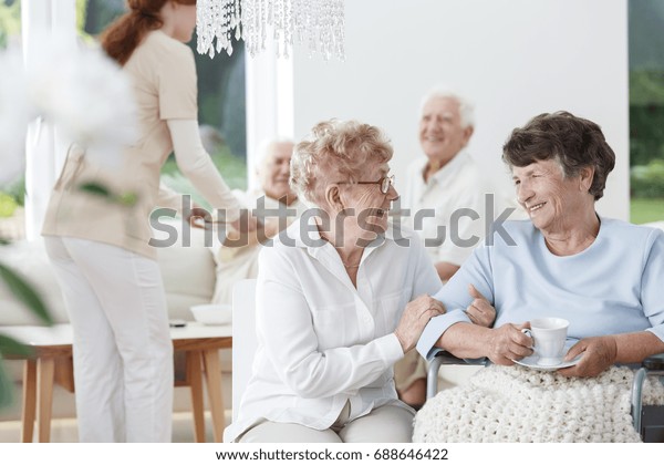 Senior Woman On Wheelchair Tells Jokes Stock Photo Edit Now