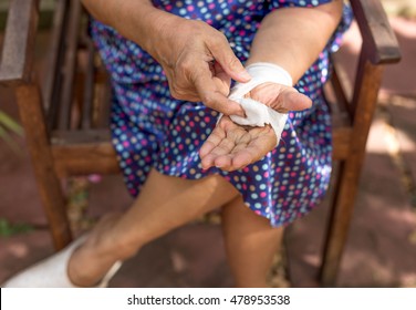 Senior Woman Open Bandage Show Her Stretch From Carpal Tunnel Syndrome Surgical