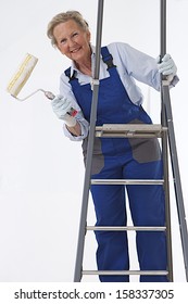 Senior Woman With Painting Cans