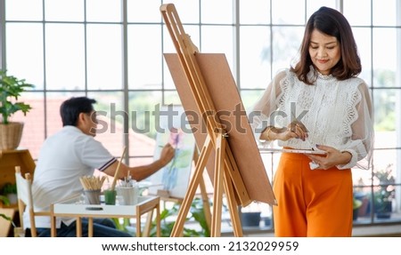 Similar – Image, Stock Photo Elderly woman painting in her art studio
