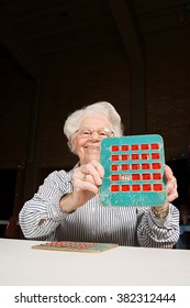 Senior Woman Playing Bingo