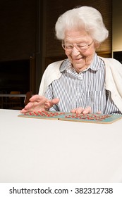 Senior Woman Playing Bingo