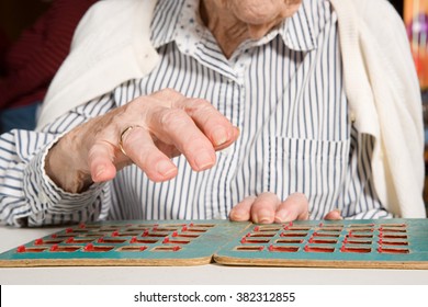 Senior Woman Playing Bingo