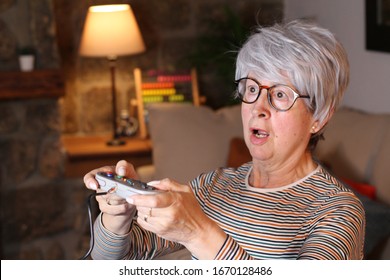 Senior Woman Playing Video Games