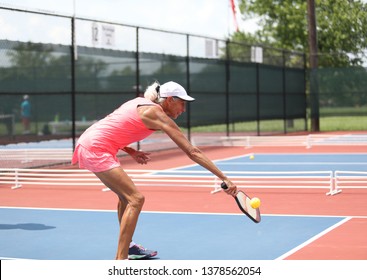 A Senior Woman Plays Pickleball