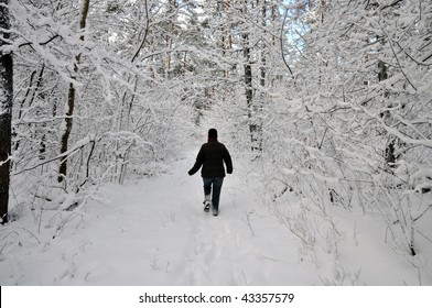 Senior Woman Plowing Through High Snow