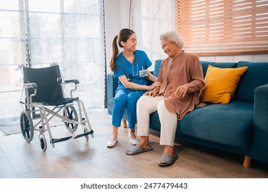 Senior Woman Receives Medical Advice and Treatment from a Doctor in a Hospital: Health Care Professionals Provide Help and Care to Elderly Patients with Insurance in a Clinical Setting - Powered by Shutterstock