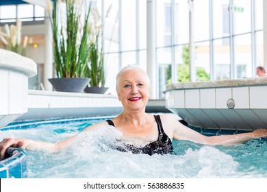 Senior Woman Relaxing In Wellness Spa