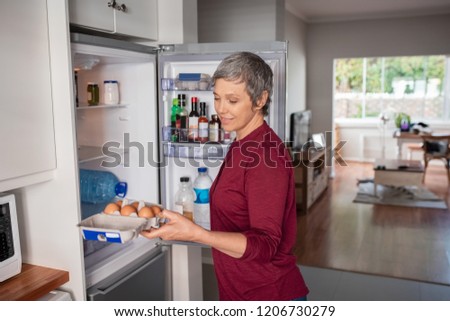 Similar – Image, Stock Photo Eggs in a carton