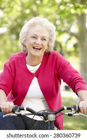 Senior Woman Riding Bike