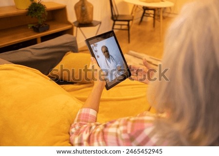 Similar – Female doctor showing an x-ray on the tablet