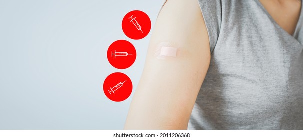 senior woman showing  her arm with bandage after got vaccinated or inoculation three dose or booster dose due to spread of corona virus, population, social or herd immunity concept
 - Shutterstock ID 2011206368
