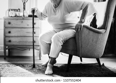 Senior woman sitting in a chair