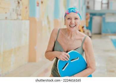 Senior Woman, Smile And Swimming Lesson, Pool And Workout, Sport And Training With Happiness Indoor. Portrait, Happy Or Elderly Female At Swimming Pool For Swim Class, Learning Or Exercise With Board