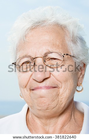 Similar – Image, Stock Photo Elderly woman in yellow top with a warm smile