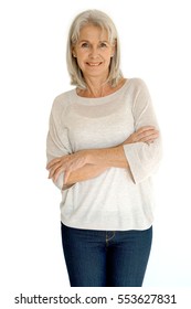 Senior woman standing on white background