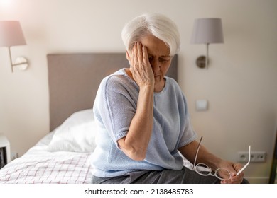 Senior woman suffering from a headache 
 - Powered by Shutterstock