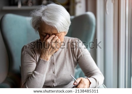 Similar – Image, Stock Photo Senior woman suffering from chest pain while her husband comforting her