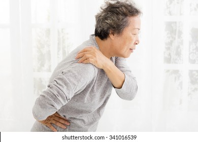 Senior Woman Suffering In Shoulder Pain