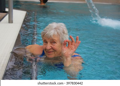 Senior Woman Swimming In A Pool