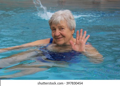 Senior Woman Swimming In A Pool