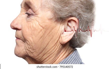 Senior Woman With Symptom Of Hearing Loss On White Background