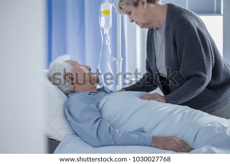 Similar – Female doctor comforting older female patient