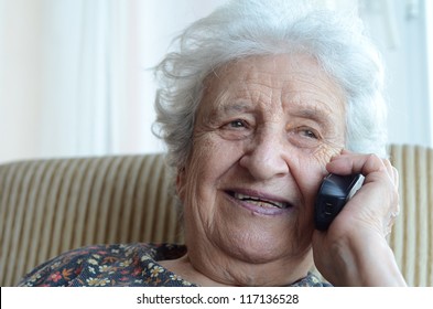 senior woman talking on phone indoor