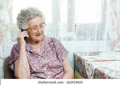 Senior Woman Talking On Phone Indoor