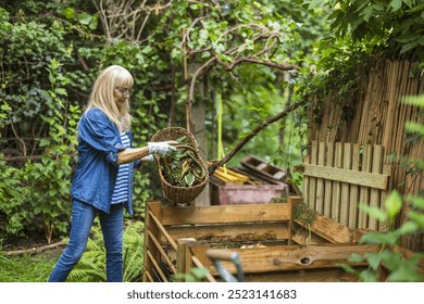 Senior woman throwing vegetable scraps into a compost heap in the backyard - Powered by Shutterstock