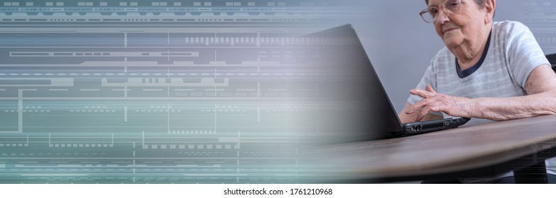 Senior Woman Using A Laptop; Panoramic Banner