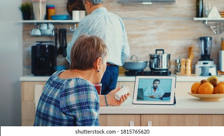 Senior Woman Using Medical App To Talk With Doctor About Her Pills Prescription. Online Health Consultation For Elderly People Drugs Ilness Advice On Symptoms, Physician Telemedicine Webcam. Medical