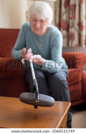 Similar – Image, Stock Photo Person with Grabber Reacher Tool