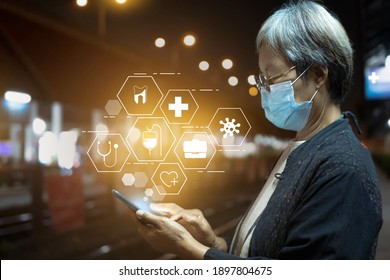 Senior Woman Using Smartphone In Train Station - Medicine Healthcare And Technology In Coronavirus Epidemic In Thailand - Concept Of Technology For Elderly Health Care