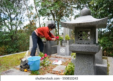 Senior Woman Visiting A Grave